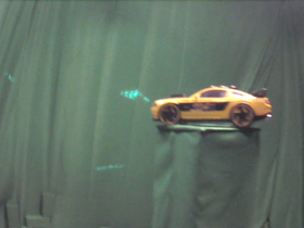 45 Degrees _ Picture 9 _ Yellow Toy Sports Car.png